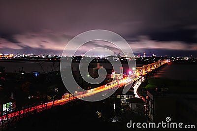 Bridge ower Agano River with moving Clouds Editorial Stock Photo