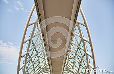 The bridge of Peace in Tbilisi over the river Kura. Part of the iron bridge. Editorial Stock Photo