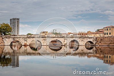 The bridge Ponte d `Augusto in Rimini, Italy Stock Photo