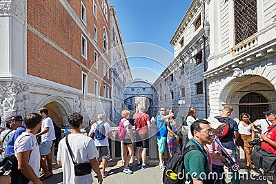 Bridge of Sighs people and tour tourists passing and shooting photos in Venice, Italy Editorial Stock Photo