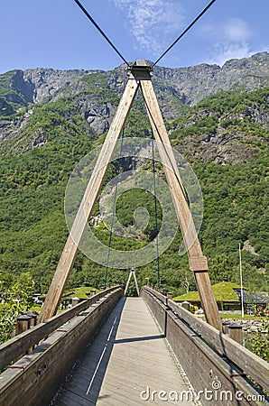 Bridge to the Viking village Gudvangen is a popular tourist village located at the Naeroyfjord. Norway Stock Photo