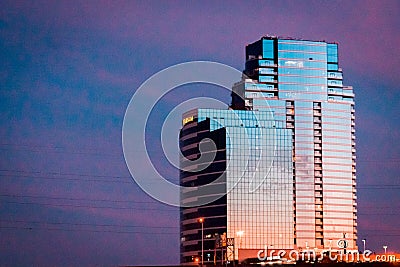 Bridge Water place standing tall on the Grand Rapids Michigan Skyline during blue hour Editorial Stock Photo