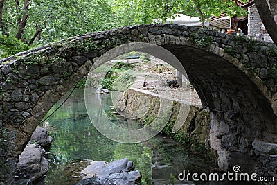 Bridge, waterfalls, river at the old town of Livadeia, in Boeotia region, Central Greece, Greece Editorial Stock Photo