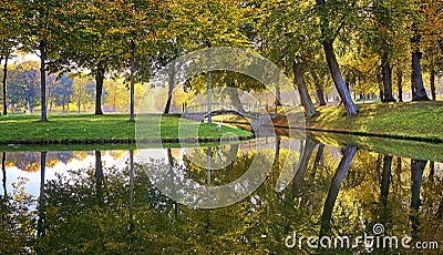 Bridge with yellow leaves autumn trees and color leaves in autumn season, Germany,Schwerin, Europe Stock Photo