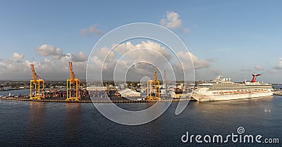 Bridgetown, Barbados - May 2, 2020: Panoramic shot of Carnival Valor docked in the port of Bridgetown. Beautiful blue sky, white Editorial Stock Photo