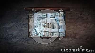 Briefcase filled with dollar packs Stock Photo