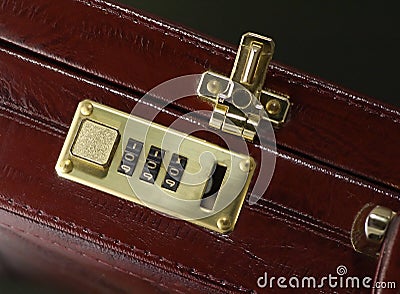 Briefcase with opened lock Stock Photo