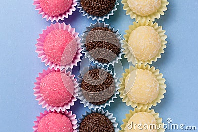 Brigadeiro Beijinho and Bicho de Pe: sweets from Brazil. Child b Stock Photo