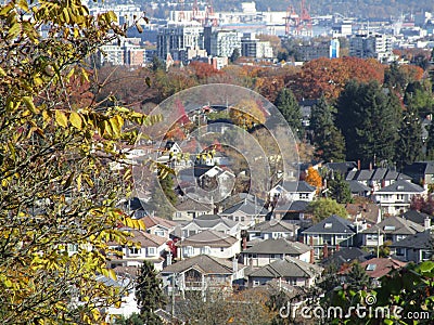 Bright attractive autumn fall view of Vancouver`s residential neighbourhood and foliage orange and colorful tree scenery Stock Photo