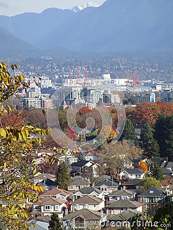 Bright attractive autumn fall view of Vancouver`s residential neighbourhood and foliage orange and colorful tree scenery Stock Photo