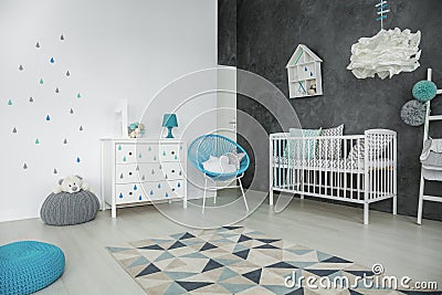 Bright baby bedroom with cot Stock Photo