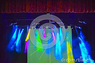 Bright background with light equipment and color rays of light. Light show design. Stock Photo