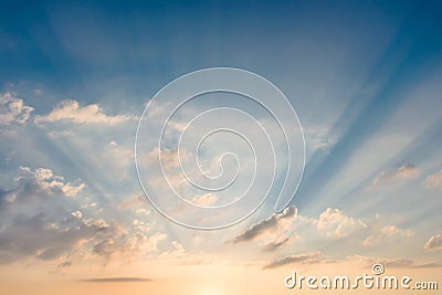 Bright beautiful sky with sunbeams making their way through the clouds Stock Photo