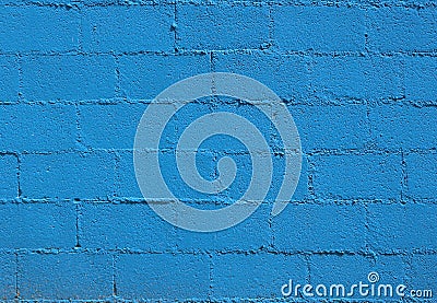 Bright blue rough cinder block wall. Background and texture Stock Photo