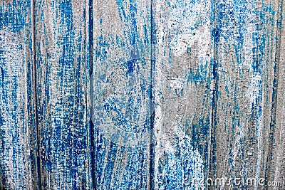 Bright blue saturated relief texture of a beautifully painted metal surface with vertical stripes and shabby erased paint Stock Photo