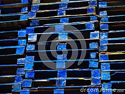 Bright blue wooden shipping palettes Stock Photo