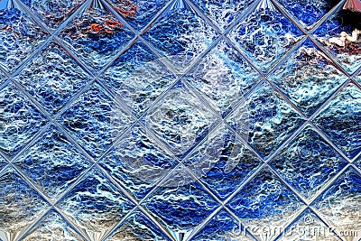 Bright blue wool is reflected in a glass tile Stock Photo