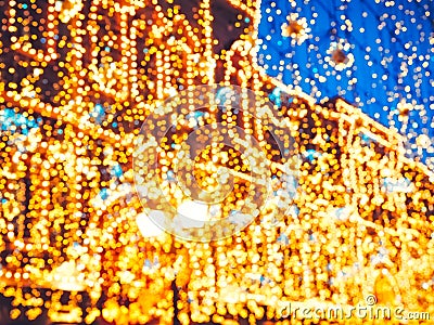 Bright Christmas Street Illumination on the facade of the buildings. The City is Decorated for the Christmastide Holiday Stock Photo