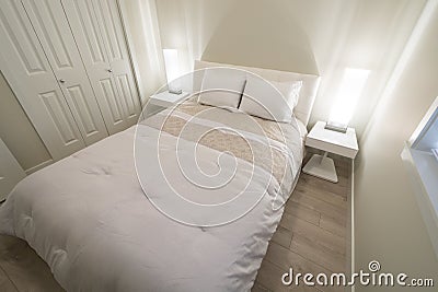 Bright and clean modern bedroom Stock Photo