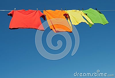 Bright clothes on a laundry line Stock Photo