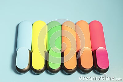Bright colored markers for highlighting text on a blue background, colored felt-tip pens for drawing Stock Photo
