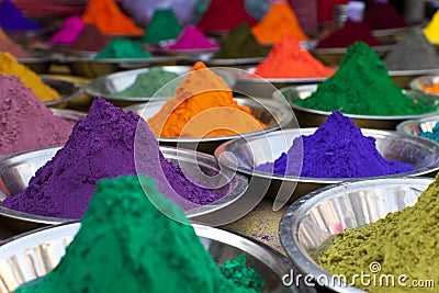 Bright colored paints in India. Organic Gulal colours in bowl for Holi festival, Hindu tradition festive. Bright vibrant pigment Stock Photo