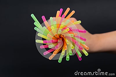 Bright colorful plastic straws line pattern artistic design Stock Photo