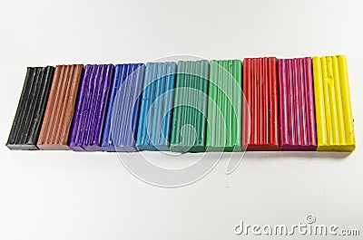 Bright colorful Plasticine and paints on white background Stock Photo