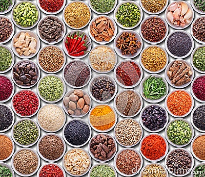 Bright colorful seamless texture with spices and herbs over whit Stock Photo