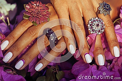 Bright colorfull shot of african tanned hands with Stock Photo