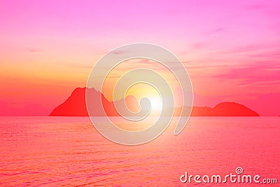 Bright colors at dawn on the beach at sunrise in the Gulf of Thailand. Stock Photo