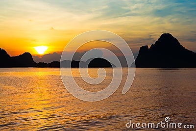 Bright colors at dawn on the beach at sunrise in the Gulf of Thailand. Stock Photo