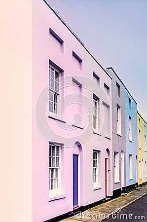 Bright colourful symmetrical row, terrace houses Stock Photo
