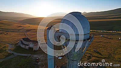 Bright dawn over the observatory in the mountains Stock Photo