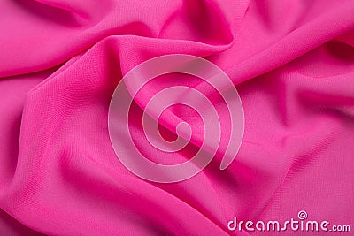 Bright draped pink background fabric Stock Photo