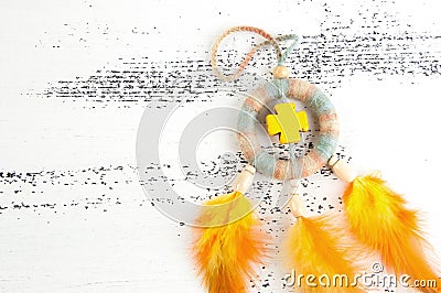 Bright dream catcher with yellow cross Stock Photo