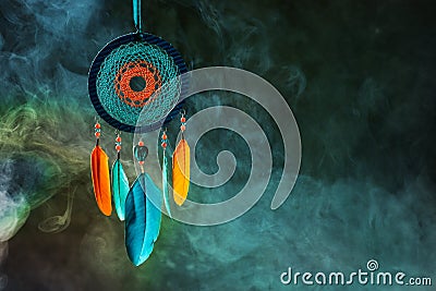 Dreamcatcher on dark background Stock Photo