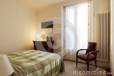 Bright elegant bedroom. Vintage apartment interior with modern furniture Stock Photo