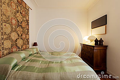 Bright elegant bedroom. Vintage apartment interior with modern furniture Stock Photo