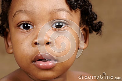 Bright eyed toddler Stock Photo
