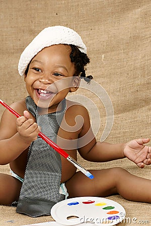 Bright eyed toddler with hat Stock Photo