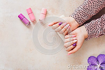 Bright festive purple and pink manicure Stock Photo
