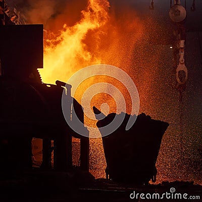 Bright flame in a smelting shop during copper production at a metallurgical plant Stock Photo