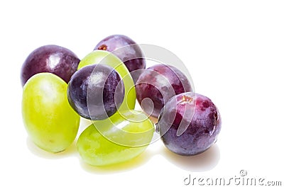 Bright grapes of bright varieties on a white background Stock Photo