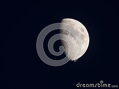 Bright half moon in the silent sky Stock Photo