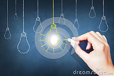 Bright idea on blackboard concept Stock Photo