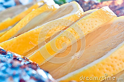 Bright juicy yellow lobules of Stock Photo