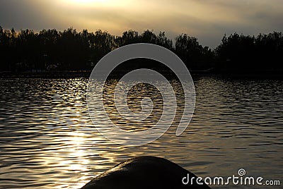 Bright lake in dark background Stock Photo