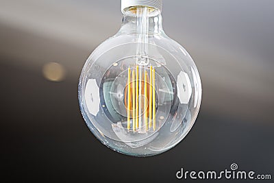 Bright light bulb vintage design close up still Stock Photo