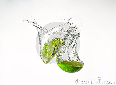 Lime in water and beautiful spray Stock Photo